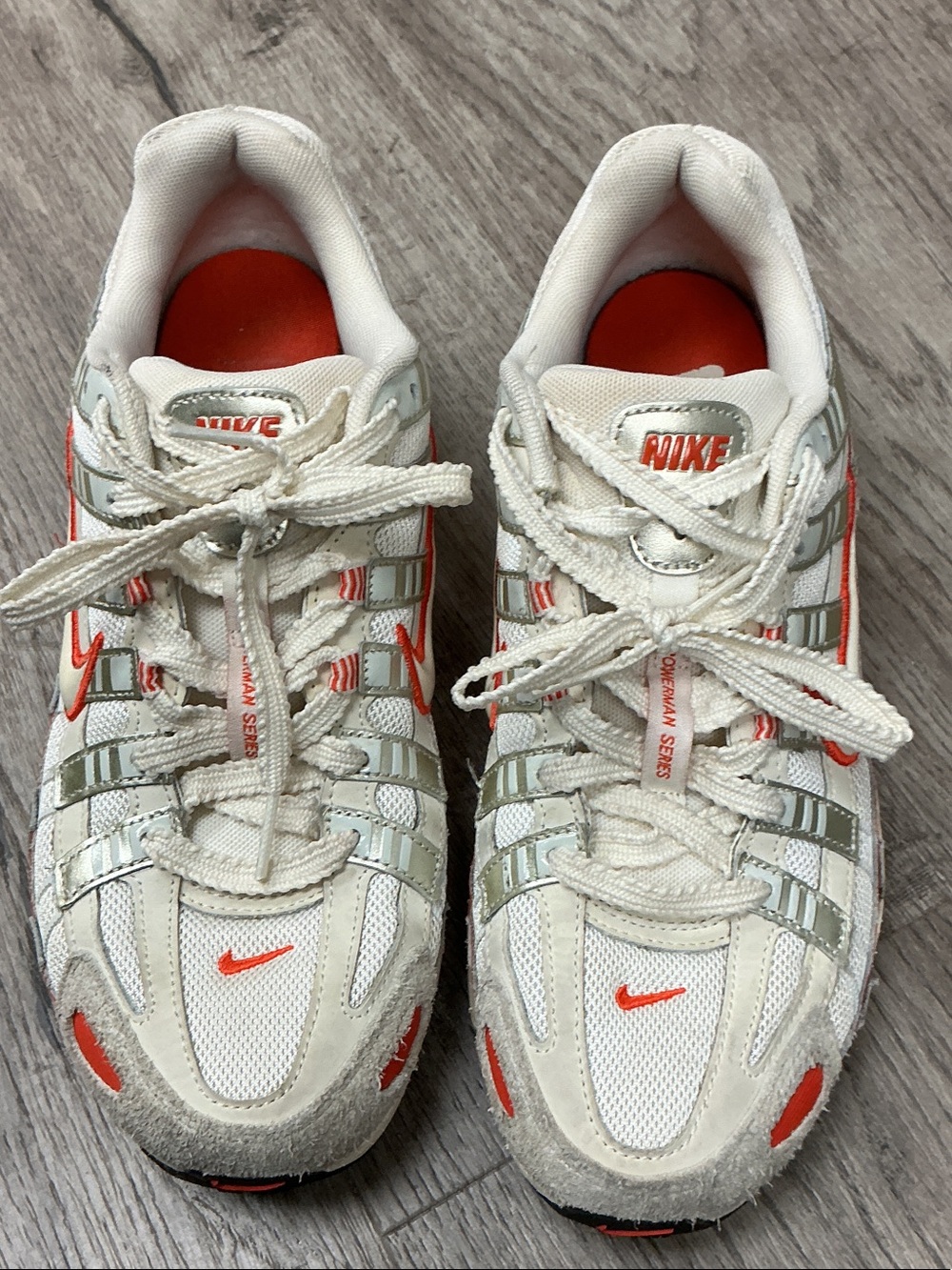 NikeWhite and Orange Lightweight Sneakers
